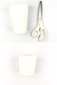 Paper cup and scissors for spider craft